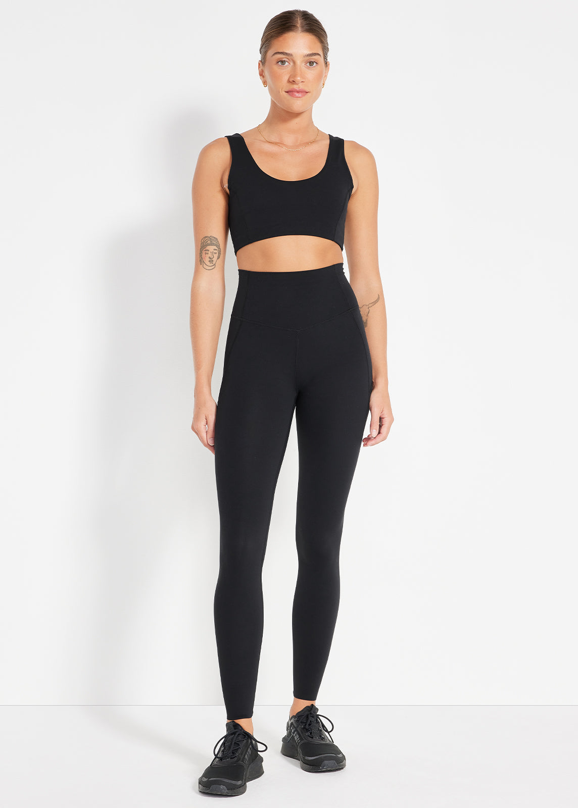 Black crop and high-rise leggings styled for an easy, all-day active look